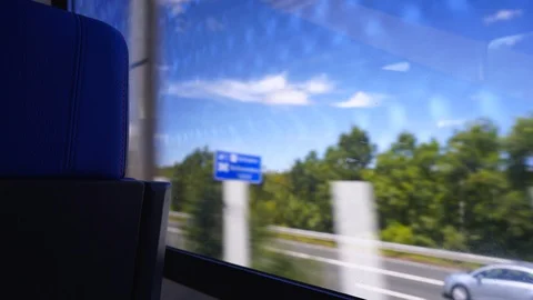Looking through Train Window at Cars on Highway Stock Footage 92083260