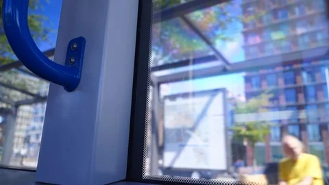 Looking through Tram Window Summer Blue Skies Stock Footage 92083566