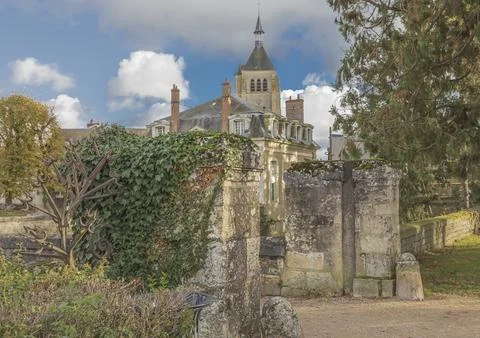 Looking through two ancient gate posts at a church Stock Photos