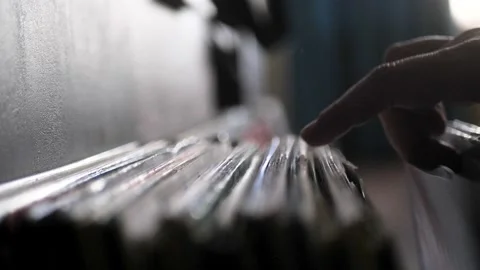 Looking Through Vinyl Records. Man Choosing Music to listen. Close up of Stock Footage 222752964