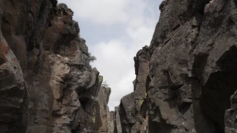 Looking up through the volcanic fissure at Crack in the Ground Oregon Stock Footage 346794585