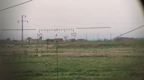 Looking through a weapon scope toward the ISIS frontline in SInjar Iraq Stock Footage 63055879