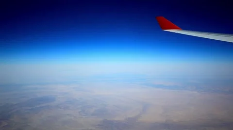 Looking through window aircraft during flight in wing with a nice blue sky. HD Stock-Footage 46949761