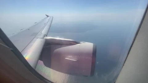 Looking through window aircraft during flight in wing Vidéo 347542935
