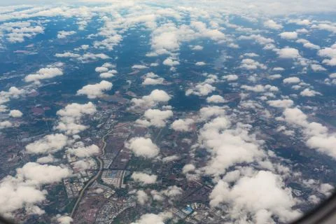 Looking through window aircraft during flight in wing with a nice blue sky Stock-Fotos