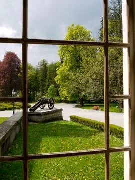 Looking through window at historic park Stock Photos