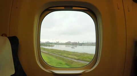 Looking through the window onboard a high speed train in Japan (Shinkansen) Stock Footage 44404144