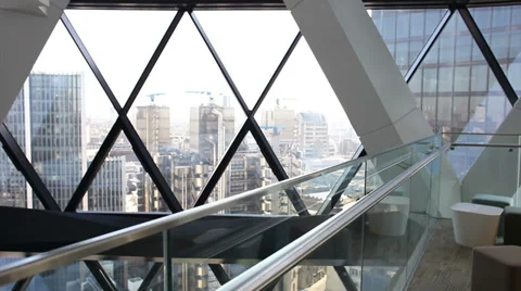 Looking through the window of a skyscraper as the camera tracks towards 库存影片 32743400