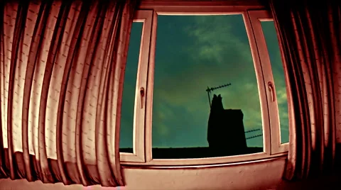 Looking through window at timelapse roofline Stock Footage 1038813