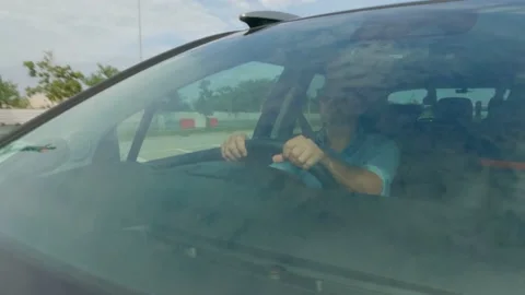Looking Through Windscreen Car Footage Of A Caucasian Man Stock Footage 144646342