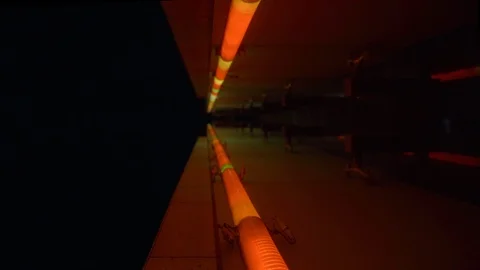 Looking up on Two Parallel Light Tubes Changing Colors and Illuminating Stock-Footage 109798375