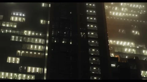 Looking upwards at corporate skyscraper with moving elevators Stock Footage 142512416