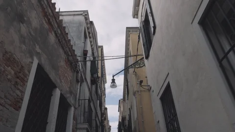 Looking upwards walking in Venice Stock Footage 90074479