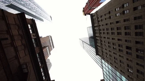 Looking up view drone shot of NYC New York City Manhattan modern skyscrapers Stock Footage