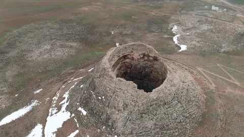 Looking into a volcano-crater, drone-shot fly-over Stock Footage 141309195