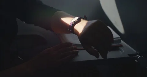 Looking at the watch in the airplane Video stock 80251808