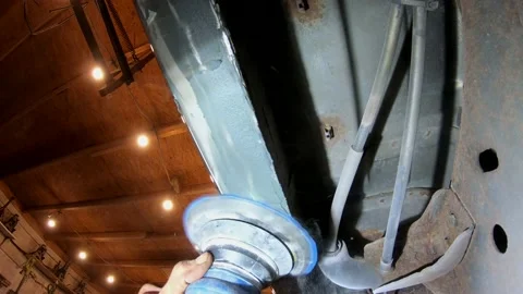 Looking Up While Sanding Body Filler Stock Footage 154807827