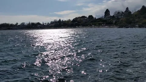 Looking at Willow's Beach from the trail and panning Stock Footage 190809543