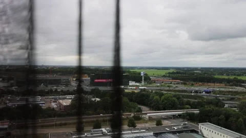 Looking from window Vídeos de archivo 220137751