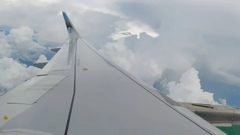 Looking On Wing And Clouds From Airplane Stock Footage 114889815