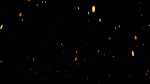 Looking up to yellow and red glowing particles falling down on black background Stock Footage 84137874