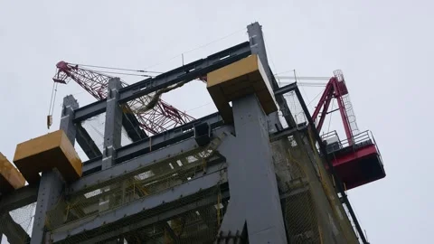 Lookup to the building and crane while in construction process working buil.. Stock Footage 322114248