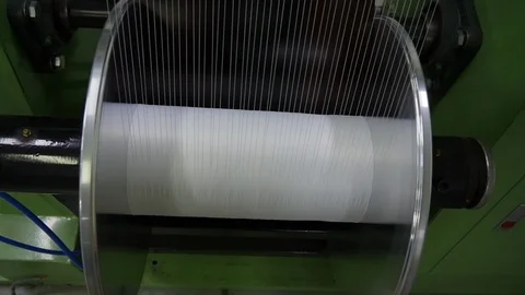 Loom creates fabric from needles and threads, slow shooting Stock Footage 103176734