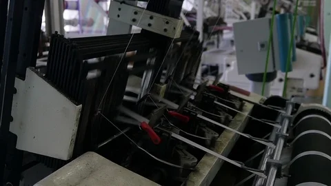 Loom creates fabric from needles and threads, slow shooting Stock Footage 103176855