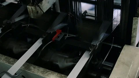 Loom creates fabric from needles and threads, slow shooting Stock Footage 103177067