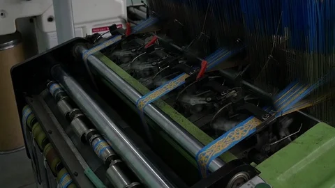 Loom creates fabric from needles and threads, slow shooting Stock Footage 103178095