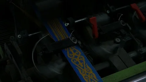 Loom creates fabric from needles and threads, slow shooting Stock Footage 103178399