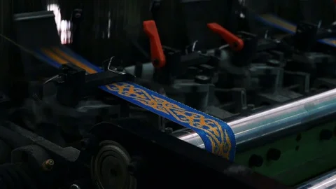 Loom creates fabric from needles and threads, slow shooting Stock Footage 103178483