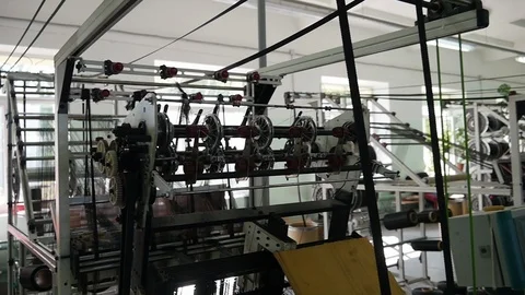 Loom creates fabric from needles and threads, slow shooting Stock Footage 103178636