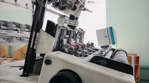 Loom creates fabric from needles and threads, slow shooting Stock Footage 103179148
