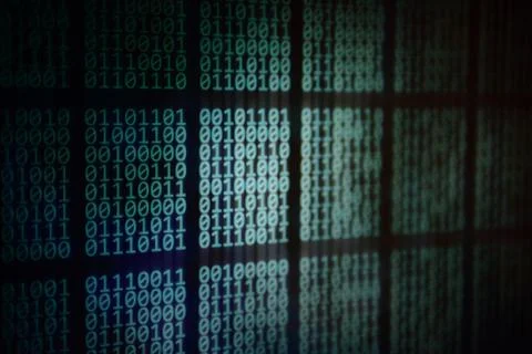 Looming data. overhead plane led panel displaying pale blue green binary code 写真素材