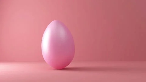 Loop 4K Animation of Painted Pink Easter Egg Spinning on pink studio Stock Footage 150960018