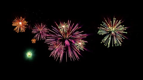 Loop-able colourful fireworks in the night sky Stock Footage 117859362