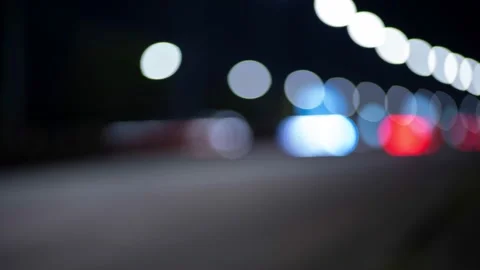 Loop able Time lapse of Night traffic lights in city. Beautiful bokeh in dark Stock Footage 136731484