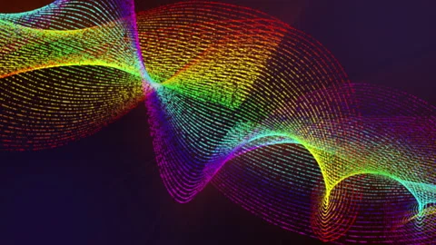 Loop abstract background with rotating multicolored particles on a black backgro Stock Footage 139887582