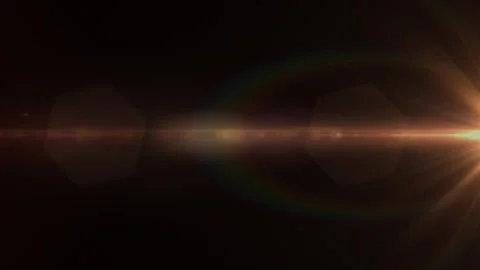 Loop abstract gold optical flare light shine from middle right Stock Footage 295943565