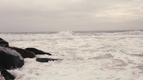 A loop of big waves in an agitated ocean Stock Footage 71072737