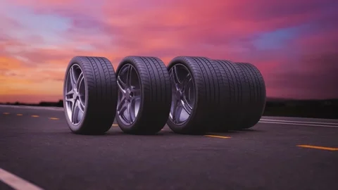 Loop car tires rolling on asphalt in the sunset Stock Footage 149137992