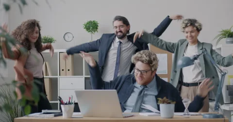 Loop of creative business people dancing celebrating successful project looking Stock Footage 275596230