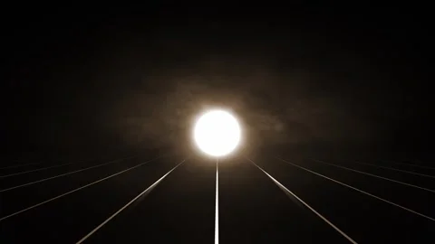 Loop dark background with a light source in the distance and smoke Stock Footage 315051595