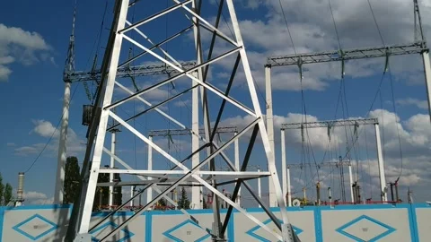 Loop of of an electricity pylon shot from a low angle, Stock Footage 137249633