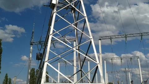 Loop of of an electricity pylon shot from a low angle, Stock Footage 137249745