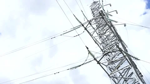 Loop of of an electricity pylon shot from a low angle, Stock Footage 137259568