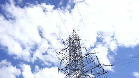 Loop of of an electricity pylon shot from a low angle, Stock Footage 137259861