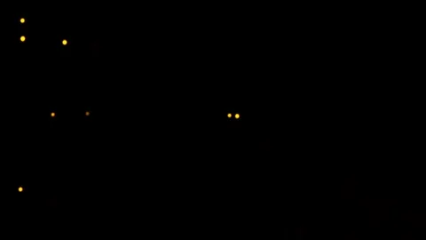 Loop flickering gold particles animation on black background Stock Footage 295943927