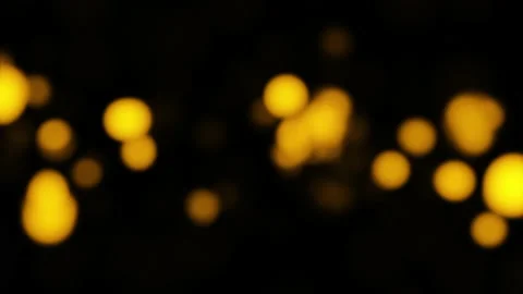 Loop glow gold bokeh animation on black background Stock Footage 236766061